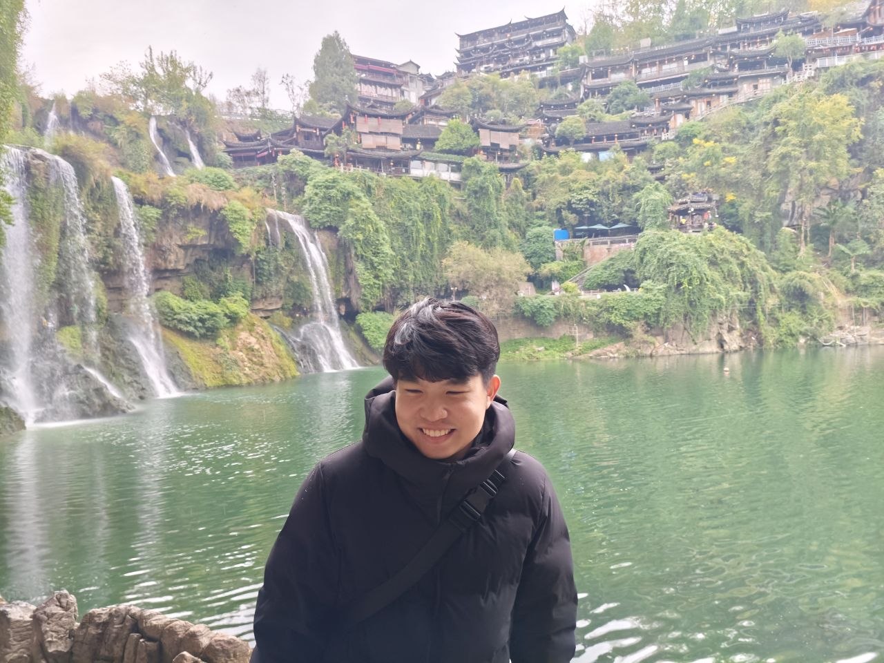 Pawee Tantivasdakarn standing outdoors